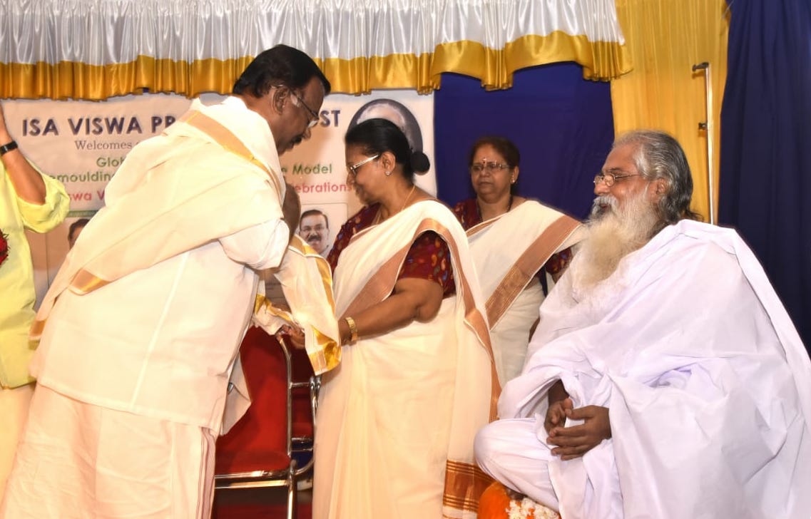 C. Divakaran meets Swami Isa at Remoulding Kerala Function