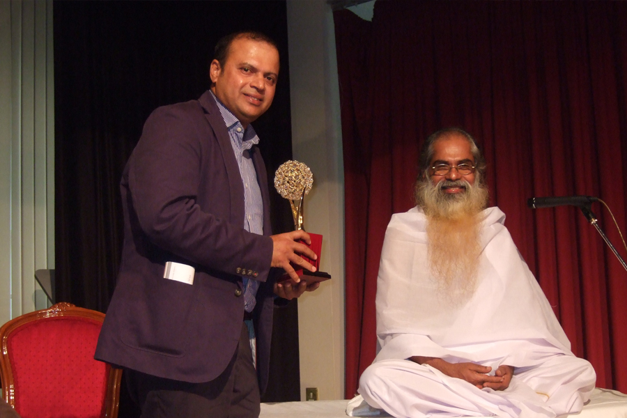 Prem Nair receives Award