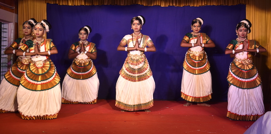 Students of Isa Viswa Vidyalayam perform a dance